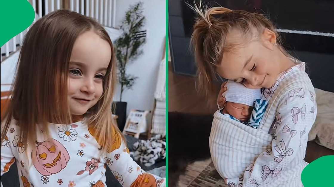 A mother placed her tiny baby in a wrap carrier on her 3-year-old's chest for them to bond A mother placed her tiny baby in a wrap carrier on her 3-year-old's chest for them to bond