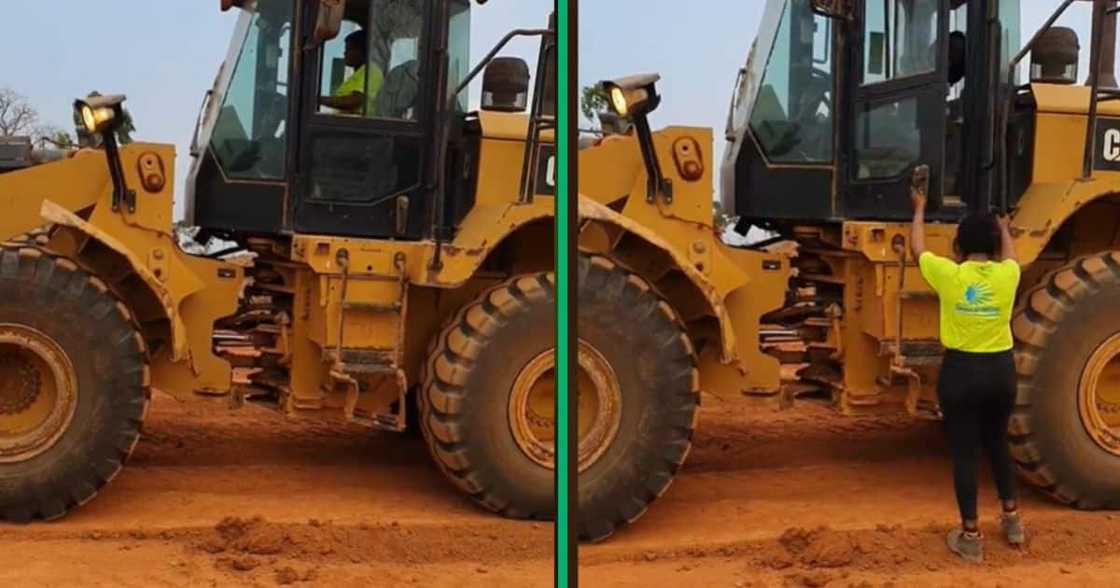 Woman drives heavy machine with ease Woman drives heavy machine with ease
