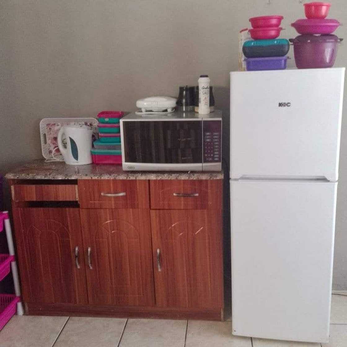 The lady shows her kitchen and how it looks. The lady shows her kitchen and how it looks.