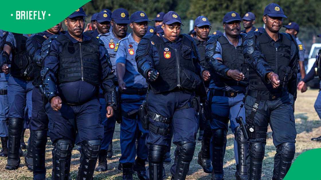Officers in the South African Police Service (SAPS) participate in a parade at FNB Stadium on June 26, 2026 in Johannesburg, South Africa