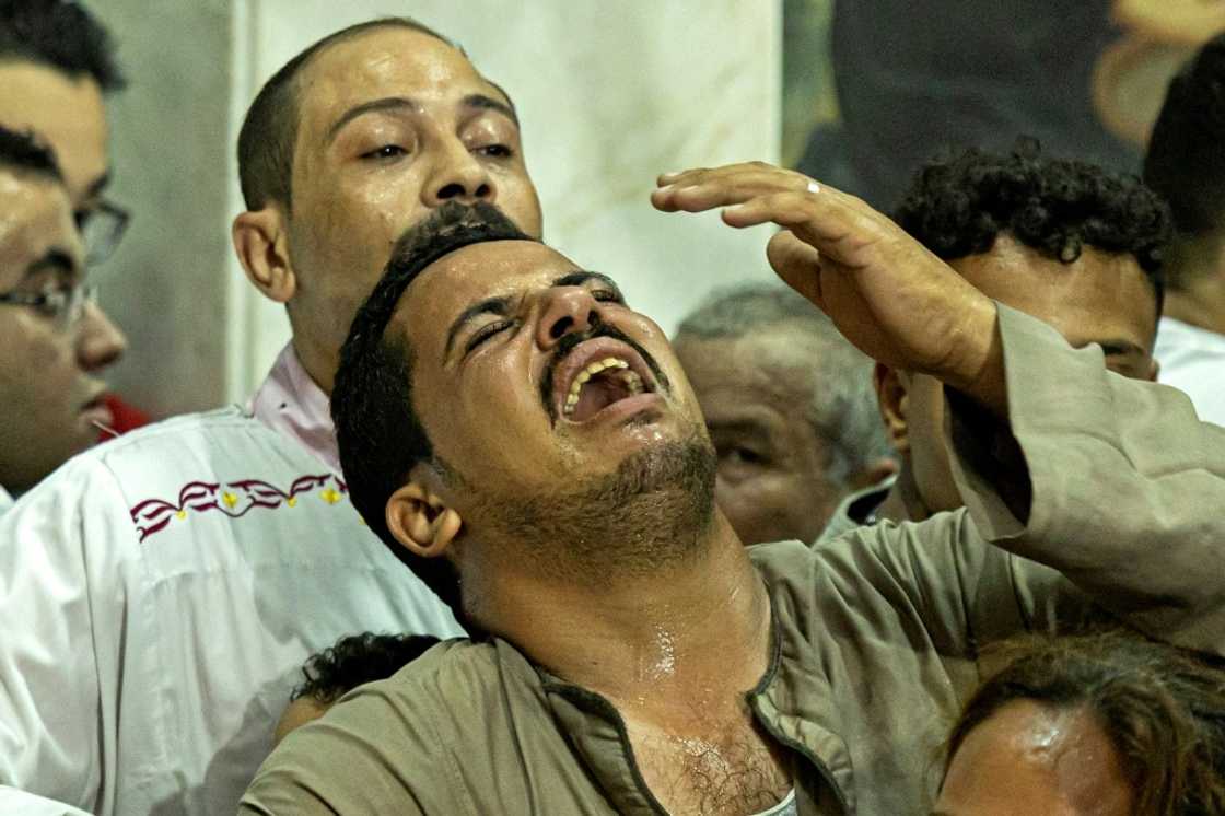 Funerals were held in two Cairo churches for 41 victims of the fire that ripped through a Coptic Christian church during Sunday mass Funerals were held in two Cairo churches for 41 victims of the fire that ripped through a Coptic Christian church during Sunday mass