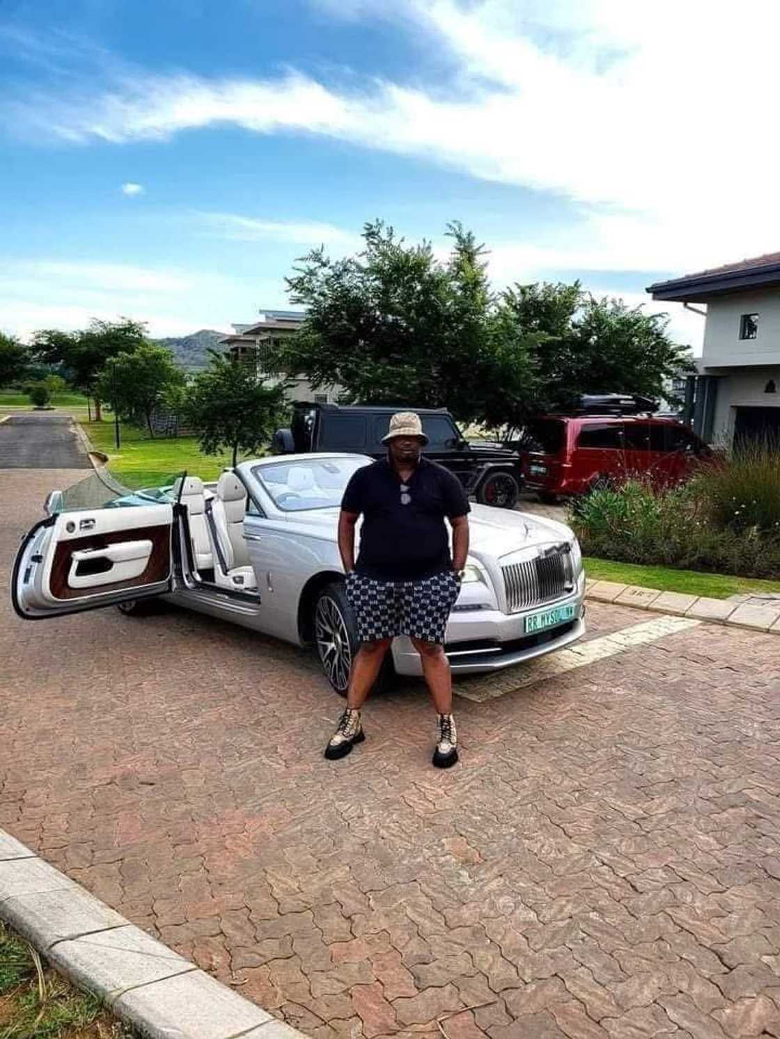 Businessman Solly Soka in front of his house.