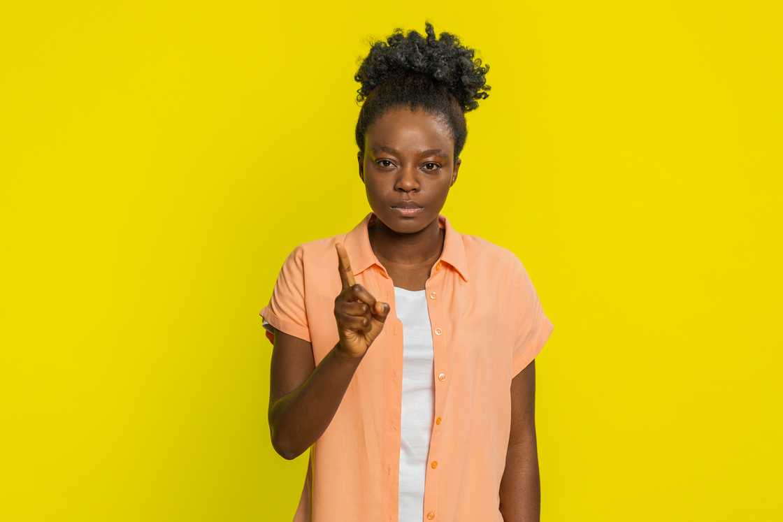 A woman shaking her head -saying no A woman shaking her head -saying no