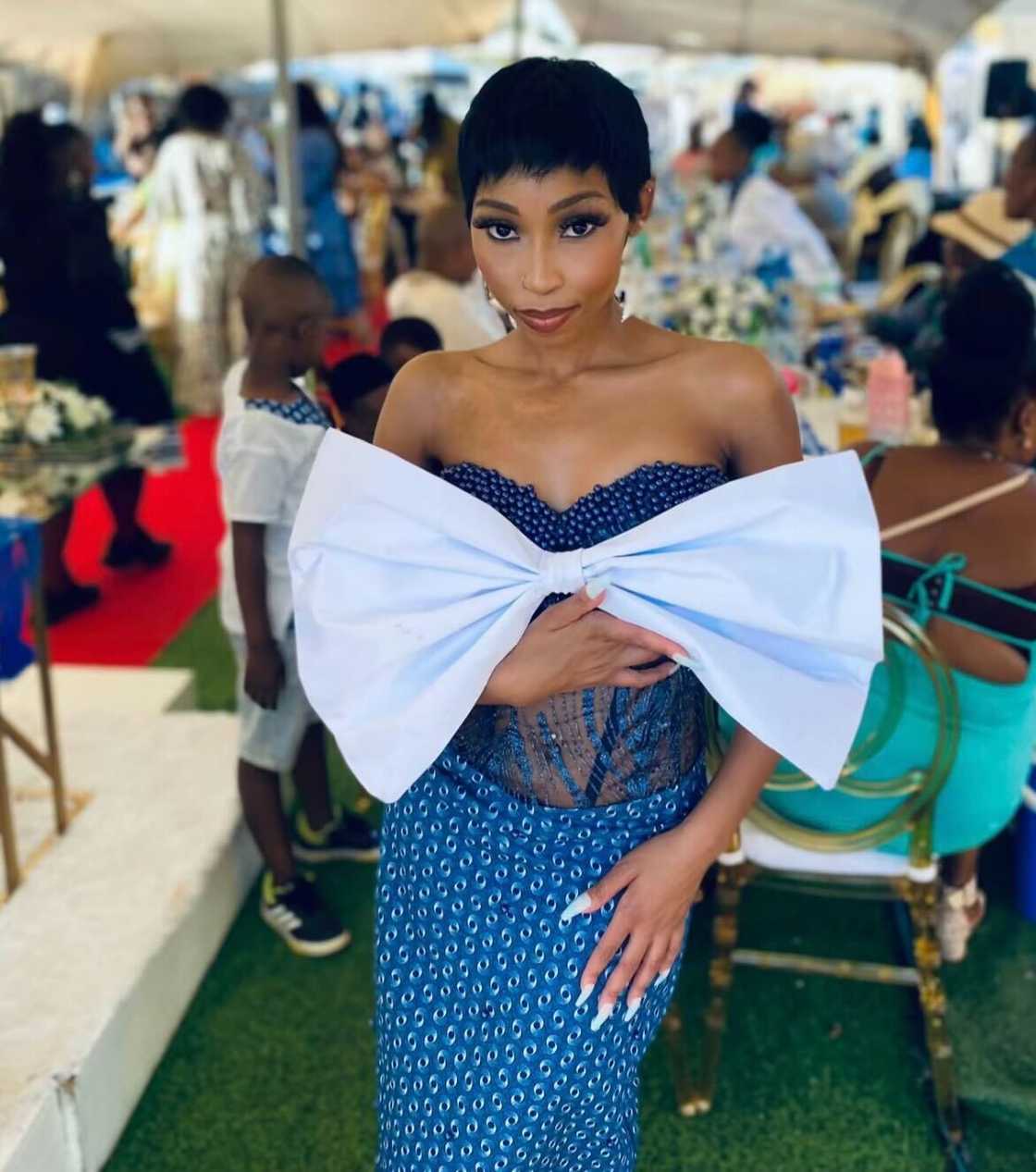 A woman showcased shoes being sold at an impressive deal in South Africa. A woman showcased shoes being sold at an impressive deal in South Africa.