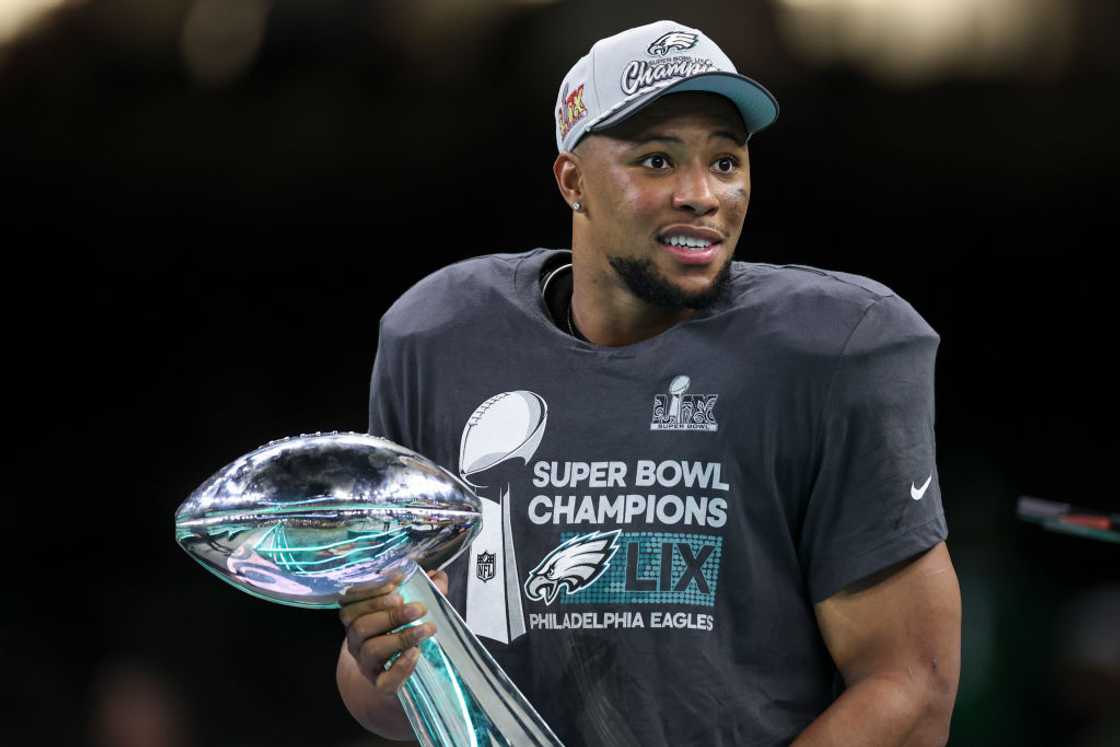 Saquon Barkley with the Vince Lombardi Trophy
