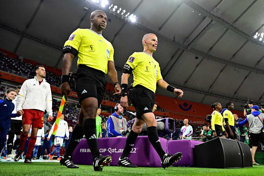 South African assistant referee Zakhele Siwela and referee Victor Gomes before officiating Japan vs Spain at the Qatar 2022 World Cup. South African assistant referee Zakhele Siwela and referee Victor Gomes before officiating Japan vs Spain at the Qatar 2022 World Cup.