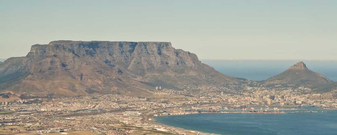 An aerial view of Table Mountain and Lion's Head Peak in Nelson Mandela Bay An aerial view of Table Mountain and Lion's Head Peak in Nelson Mandela Bay