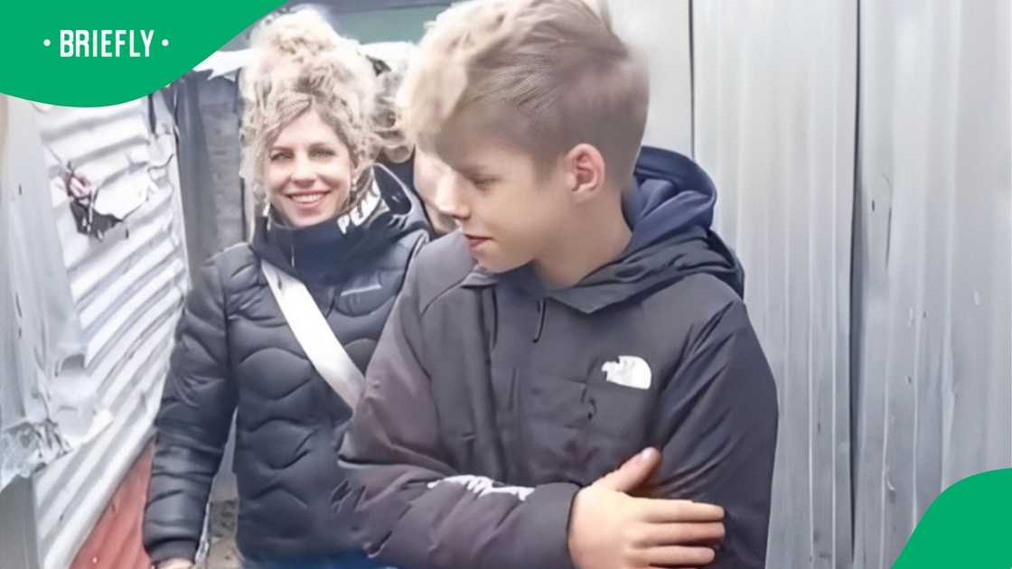 Foreigners explore informal settlements in townships Foreigners explore informal settlements in townships