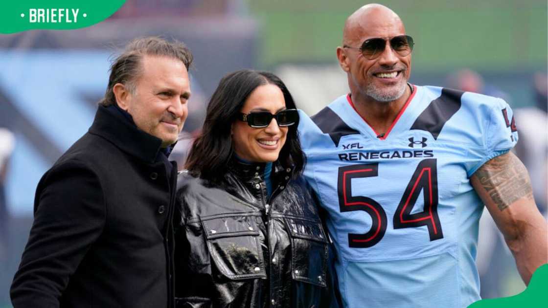 Does Dwayne Johnson own a football team?