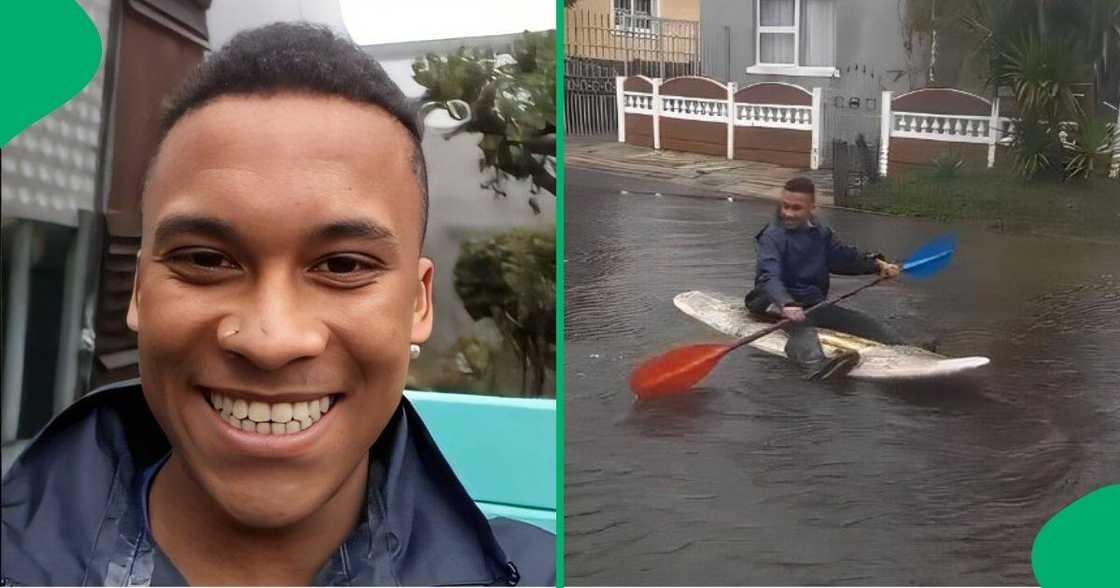 Cape Town man rows on flooded street. Cape Town man rows on flooded street.