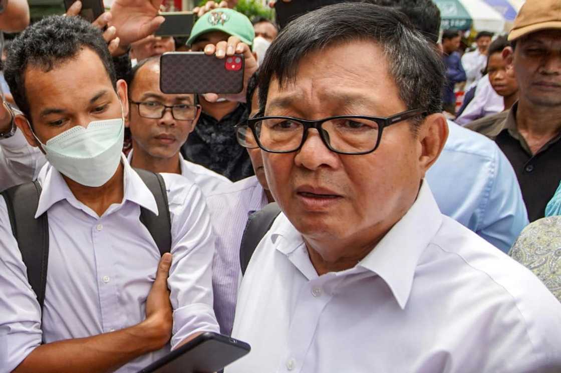 Cambodian opposition politician Son Chhay speaks outside court in Phnom Penh on Friday Cambodian opposition politician Son Chhay speaks outside court in Phnom Penh on Friday