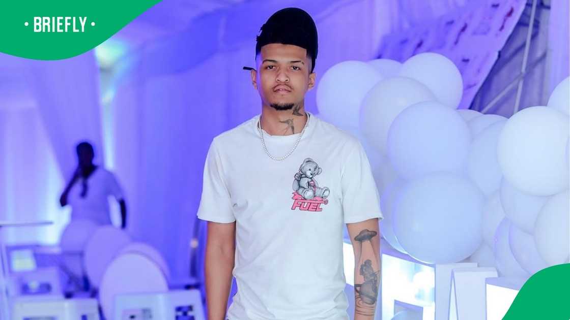 Sino Kama dances shirtless in a nightclub