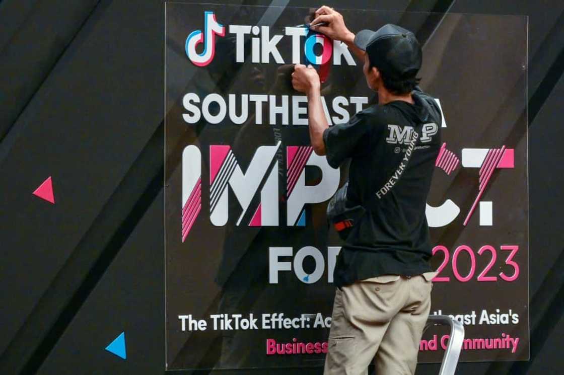 A worker finishes signage before the TikTok Southeast Asia Impact Forum 2023 in Jakarta on June 15, 2023. A worker finishes signage before the TikTok Southeast Asia Impact Forum 2023 in Jakarta on June 15, 2023.