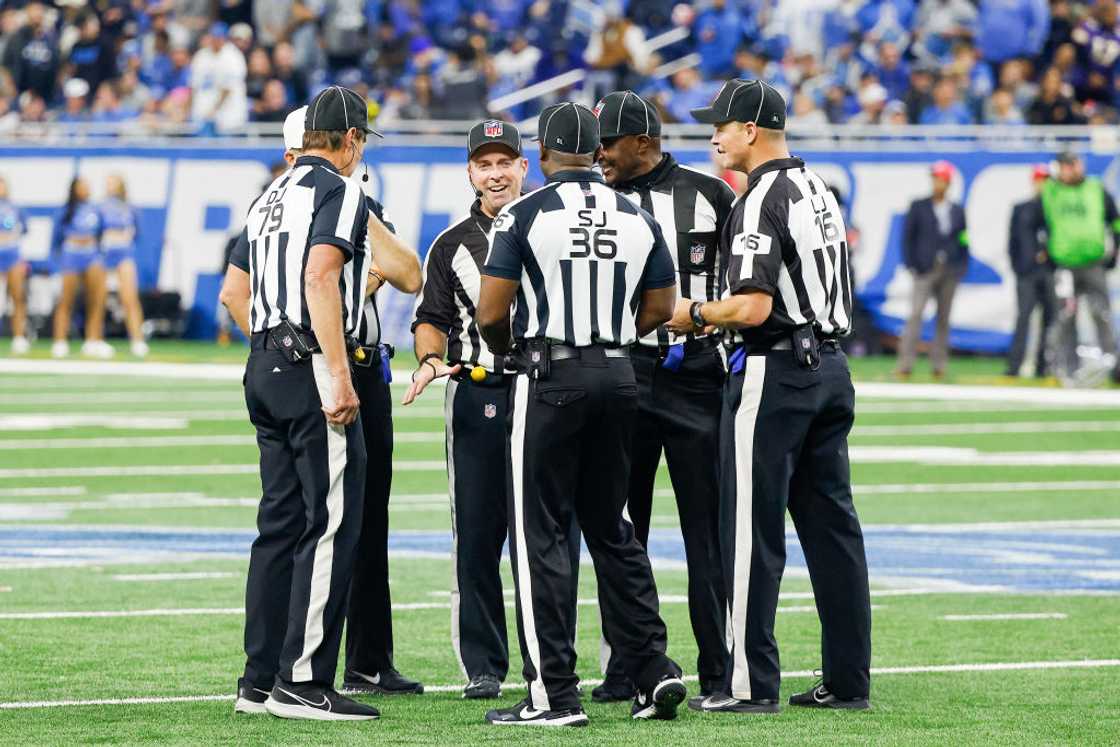 referee crew during a timeout referee crew during a timeout