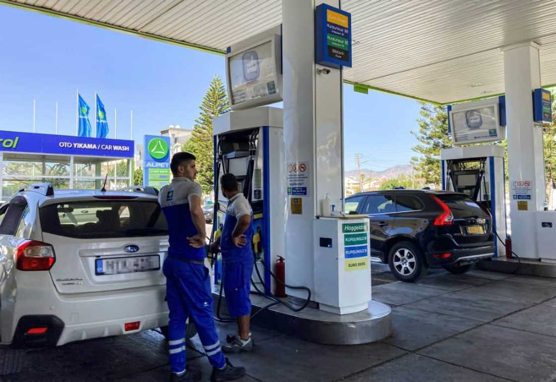 Vehicles bearing the licence plates of the Republic of Cyprus buy fuel in the Turkish-controlled northern part of Nicosia Vehicles bearing the licence plates of the Republic of Cyprus buy fuel in the Turkish-controlled northern part of Nicosia