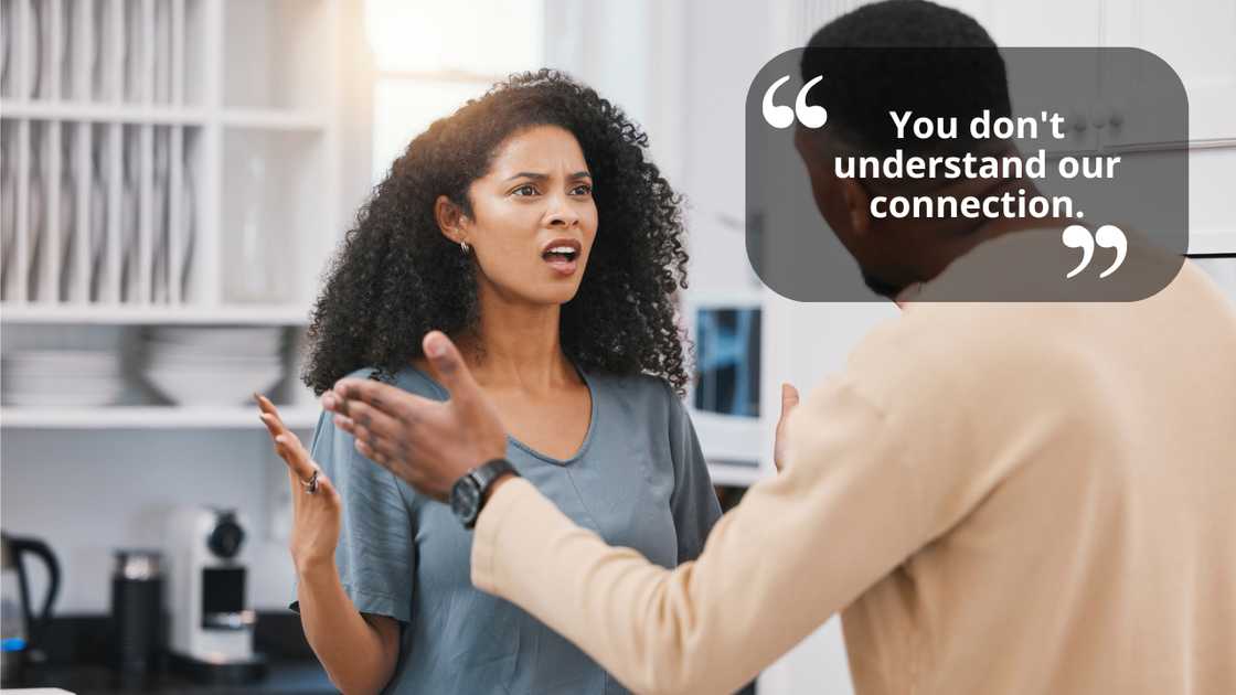 A couple arguing in the kitchen