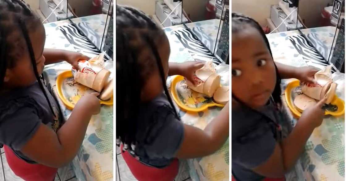 A cute little child got busted cutting thick slices of polony. A cute little child got busted cutting thick slices of polony.