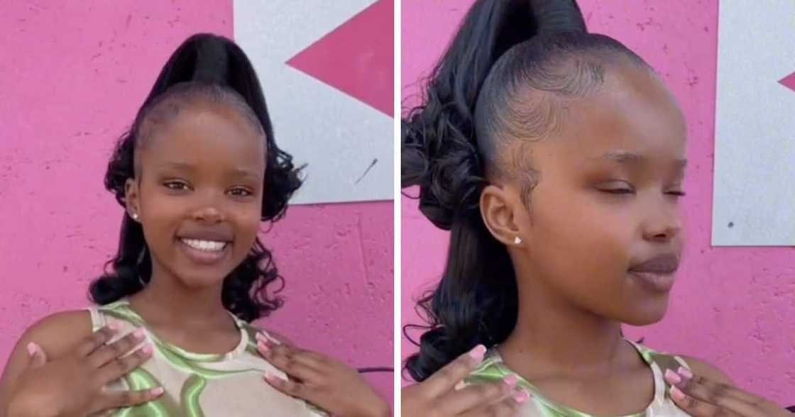 Woman flexes new pondo hairstyle.