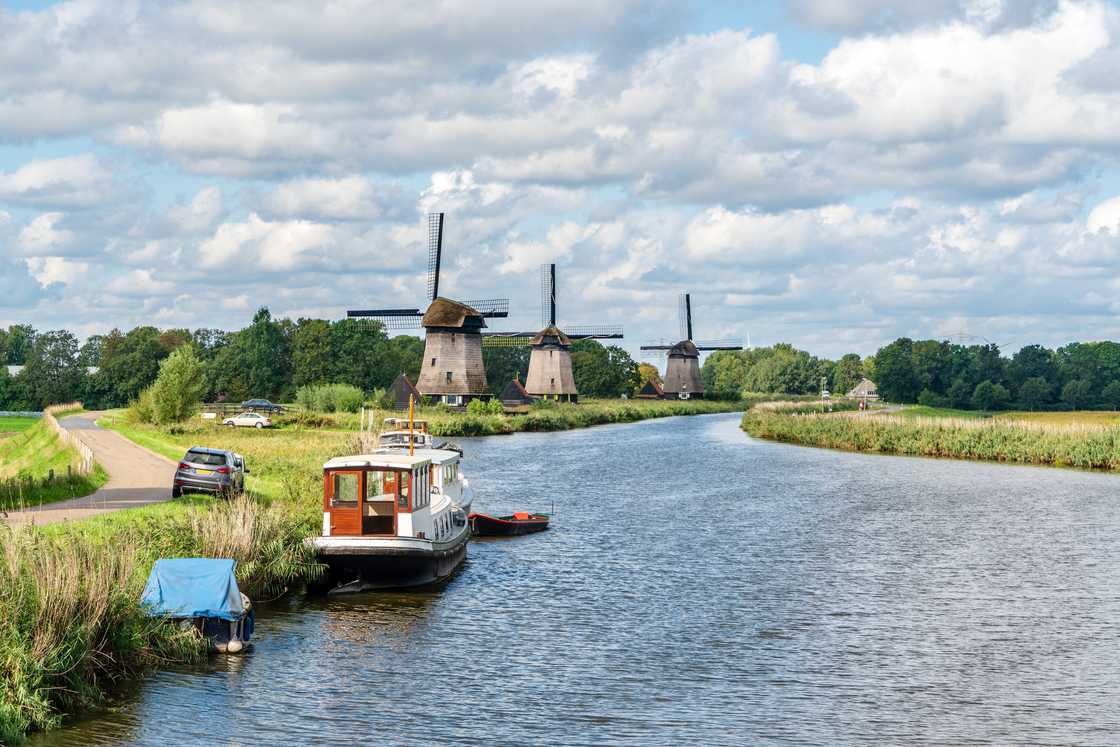 Windmills in a North Holland landscape in Rustenburg Windmills in a North Holland landscape in Rustenburg
