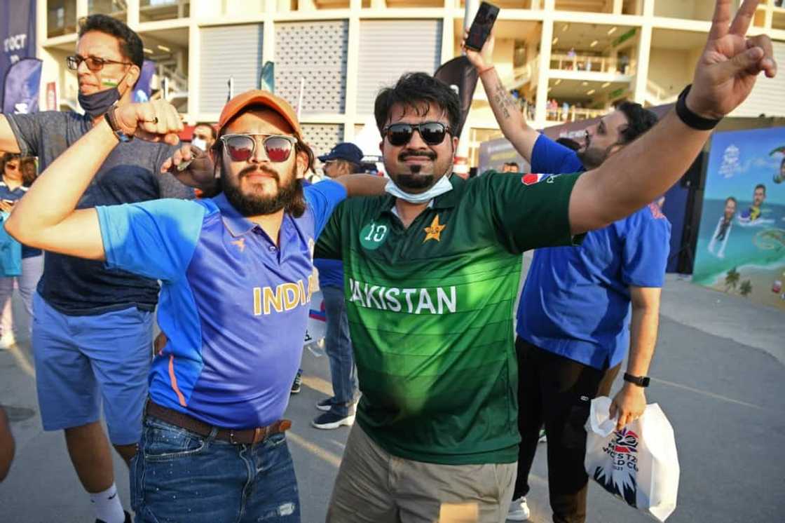 An Indian and Pakistan fan share a moment before their teams met in a group match of the  Twenty20 World Cup in Dubai in October 2021 An Indian and Pakistan fan share a moment before their teams met in a group match of the  Twenty20 World Cup in Dubai in October 2021