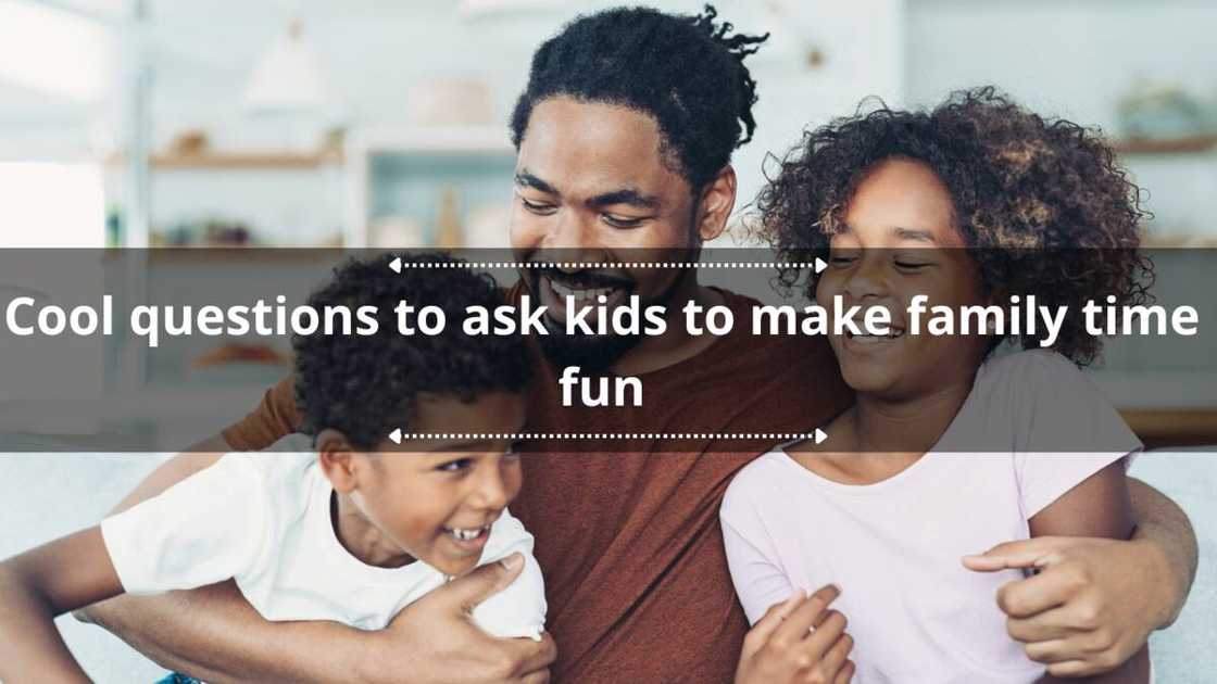 A father playing with his daughter and son at home.