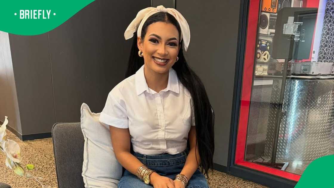 Reality TV star is gifted a cheque Reality TV star is gifted a cheque