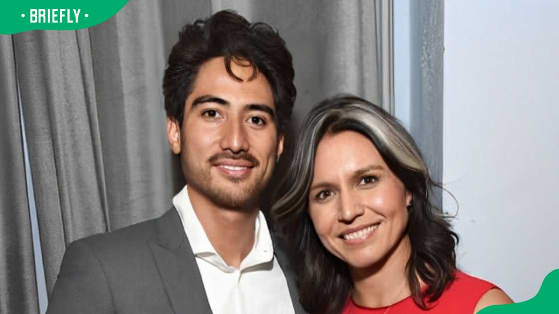 Abraham Williams (L) and Tulsi Gabbard at an event