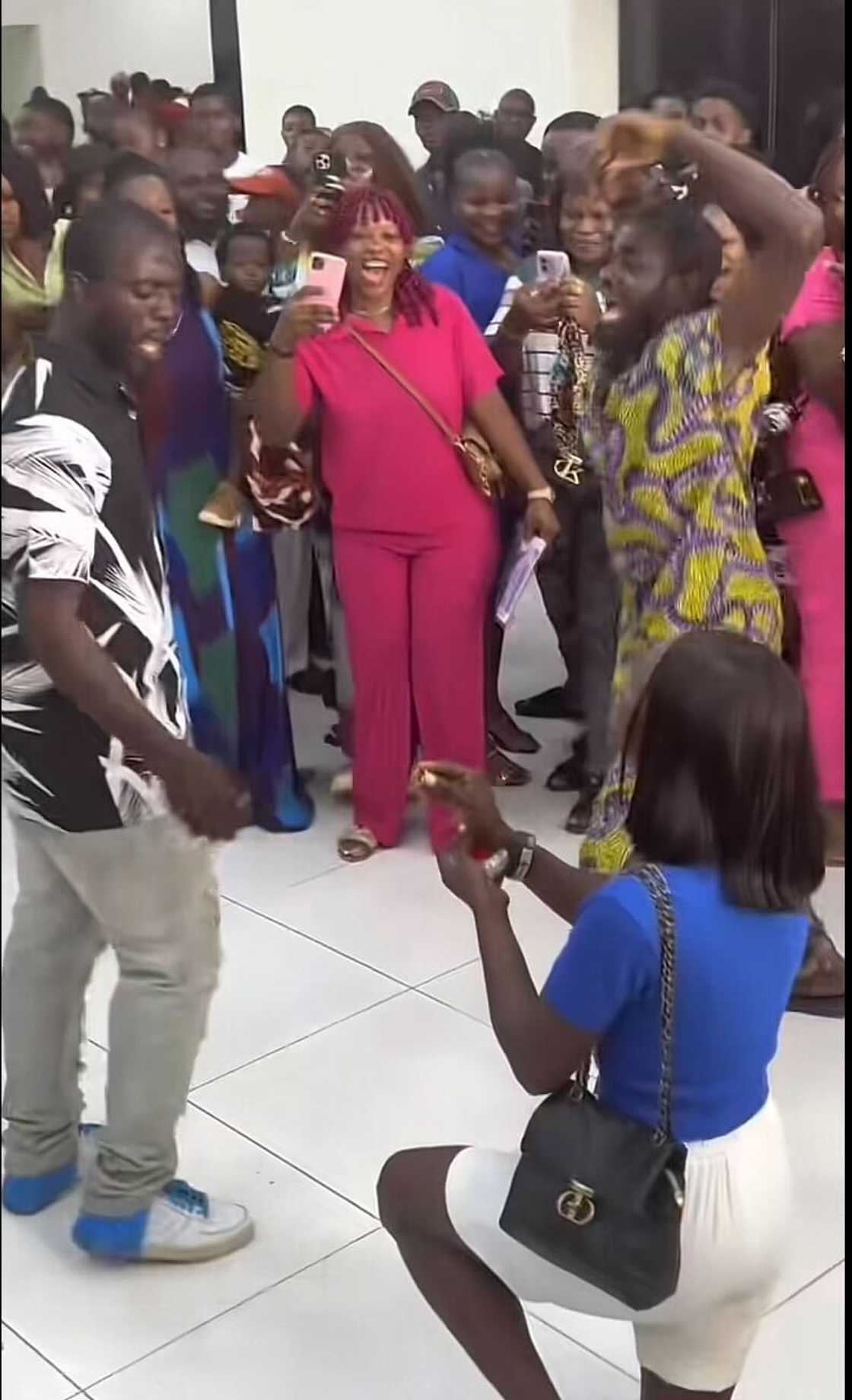 A woman was left kneeling after her man rejected her public proposal in front of a huge crowd. A woman was left kneeling after her man rejected her public proposal in front of a huge crowd.