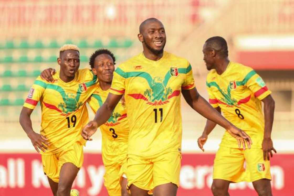 Kenya's players pose ahead of the FIFA World Cup 2022 qualifier inst Mali at Nyayo National Stadium in Nairobi on October 10, 2021. Kenya's players pose ahead of the FIFA World Cup 2022 qualifier inst Mali at Nyayo National Stadium in Nairobi on October 10, 2021.