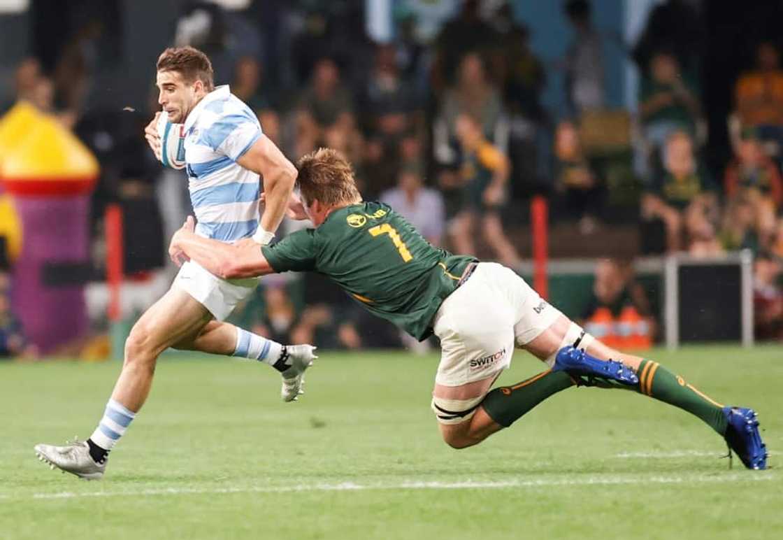 South Africa flanker Pieter-Steph du Toit (R) tackles Argentina full-back Juan Cruz Mallia during a Rugby Championship match in Durban on September 24, 2022. South Africa flanker Pieter-Steph du Toit (R) tackles Argentina full-back Juan Cruz Mallia during a Rugby Championship match in Durban on September 24, 2022.