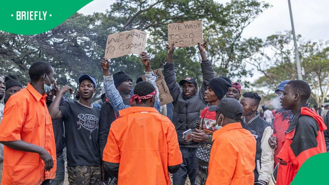 Factory workers pleaded with foreign nationals not to go and defended the value they bring in factories