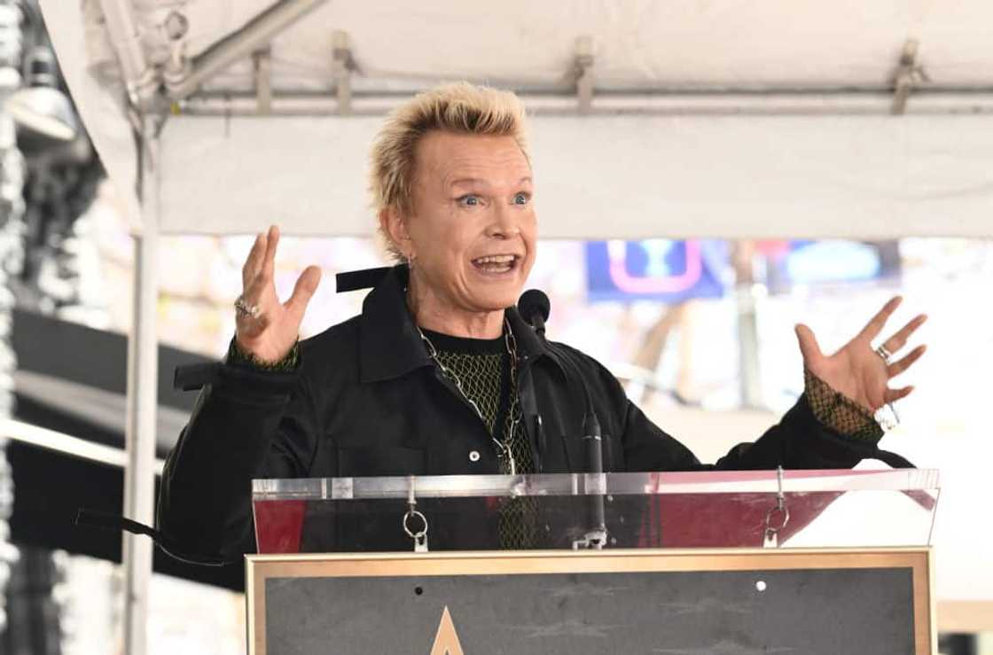 Billy Idol speaking on a podium during a ceremony honouring Richard Blade Billy Idol speaking on a podium during a ceremony honouring Richard Blade