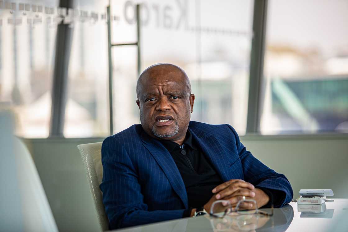 Dada Morero sits behind a desk in his office during an interview after being appointed as the new Johannesburg Mayor.