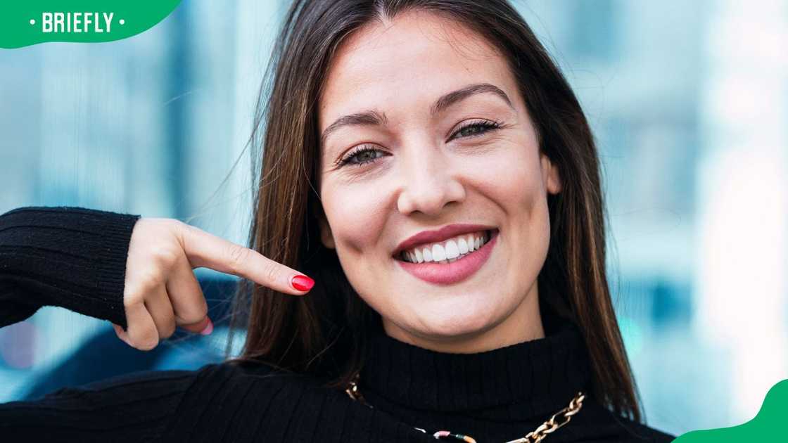 A young woman gesturing with her finger