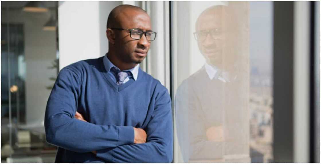 Man Thinking Of What To Do With His Boss After Finding Video Of His Office Affair Man Thinking Of What To Do With His Boss After Finding Video Of His Office Affair