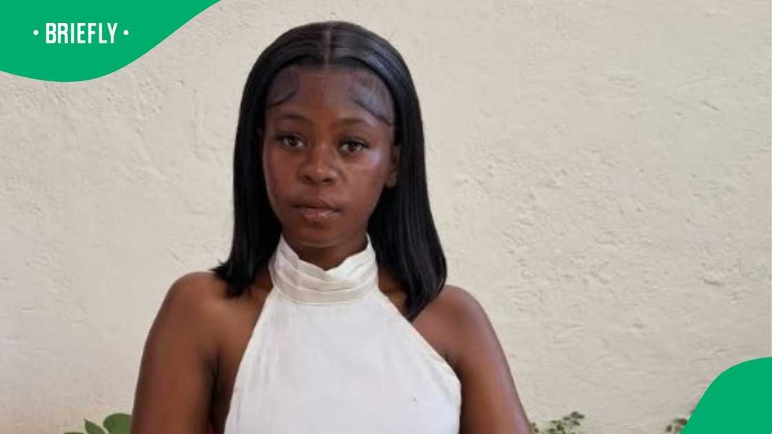 South African womancelebrates buying new car