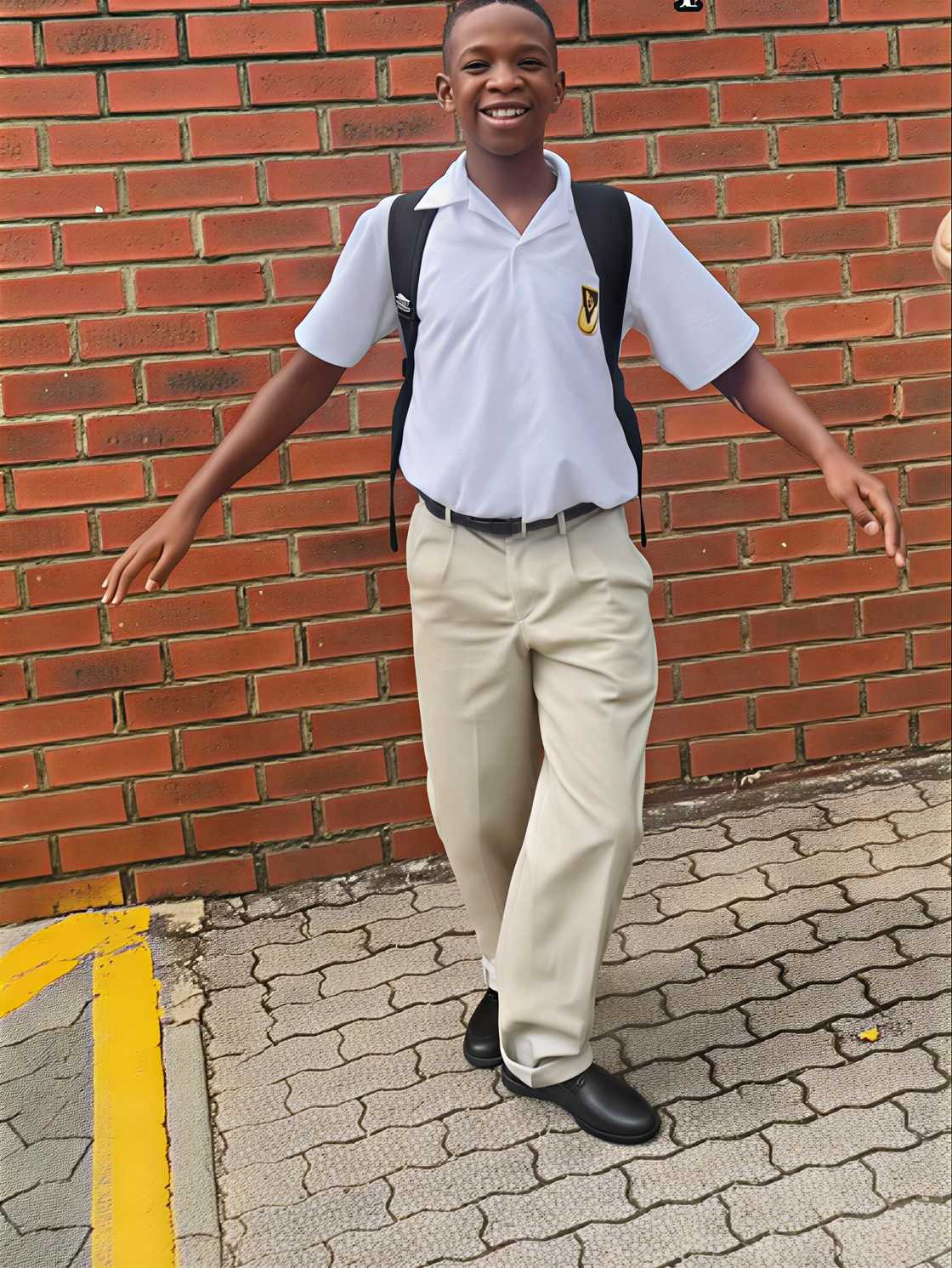 A Grade 8 pupil danced the Zep in his school uniform on the first day of school.