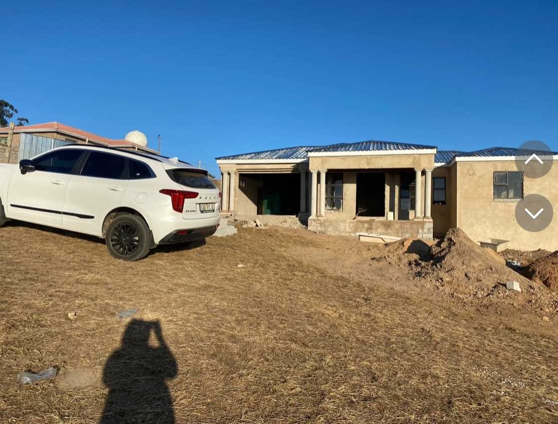Woman shows of the finished product. Woman shows of the finished product.