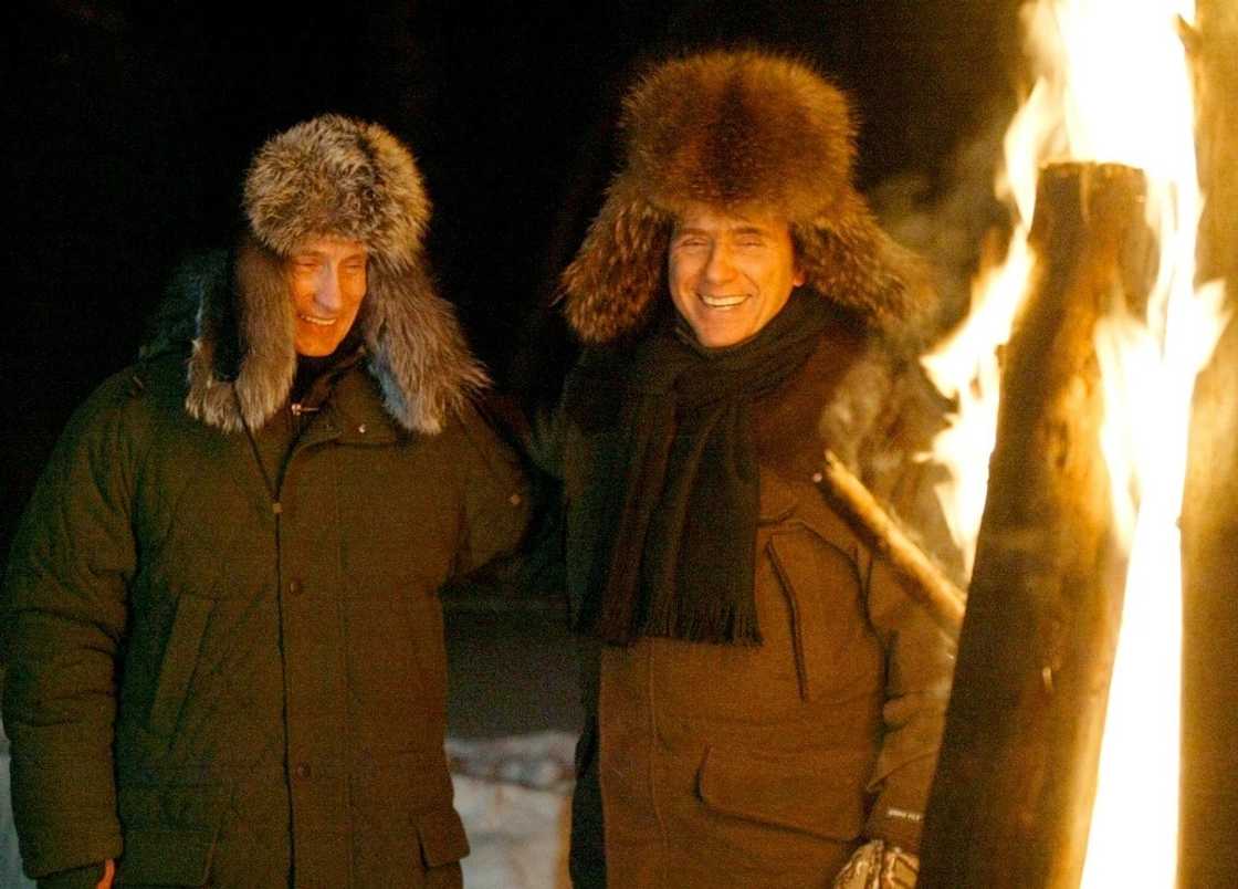Berlusconi was for years close to Russian President Vladimir Putin, shown here in Russia in February, 2003 Berlusconi was for years close to Russian President Vladimir Putin, shown here in Russia in February, 2003