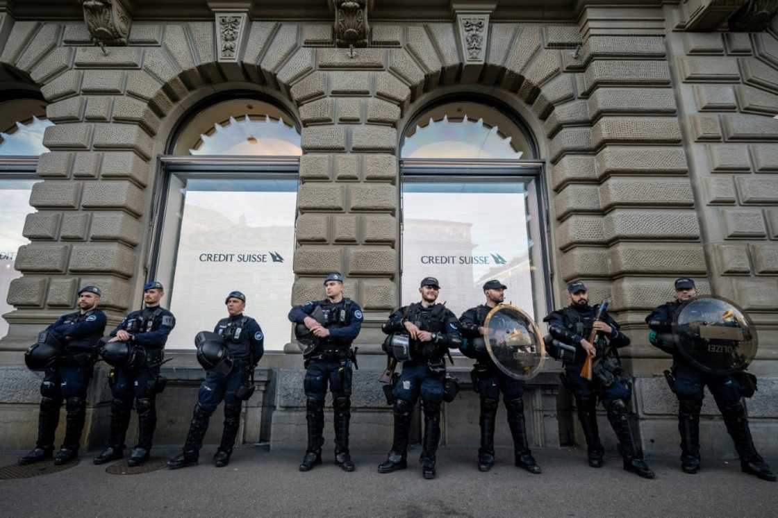 The $3.25-billion takeover announced late Sunday was mediated by the Swiss authorities to help prevent economic turmoil The $3.25-billion takeover announced late Sunday was mediated by the Swiss authorities to help prevent economic turmoil