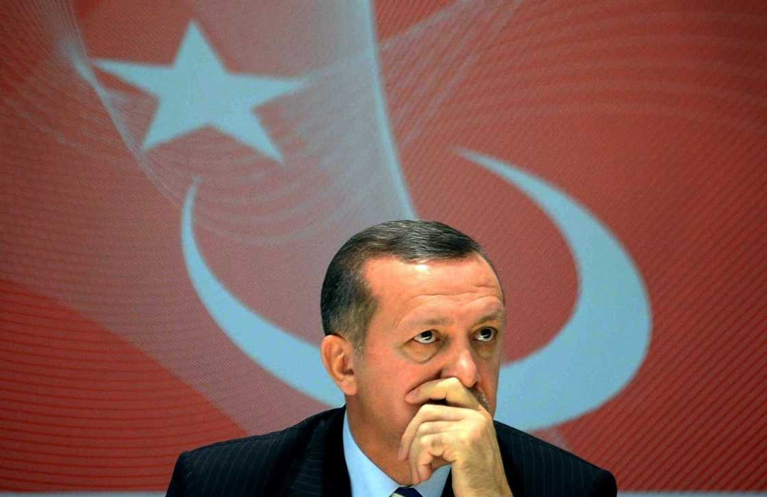 Erdogan, pictured here at a news conference to herald the new lira banknotes in 2008, spearheaded Turkey's economic transformation