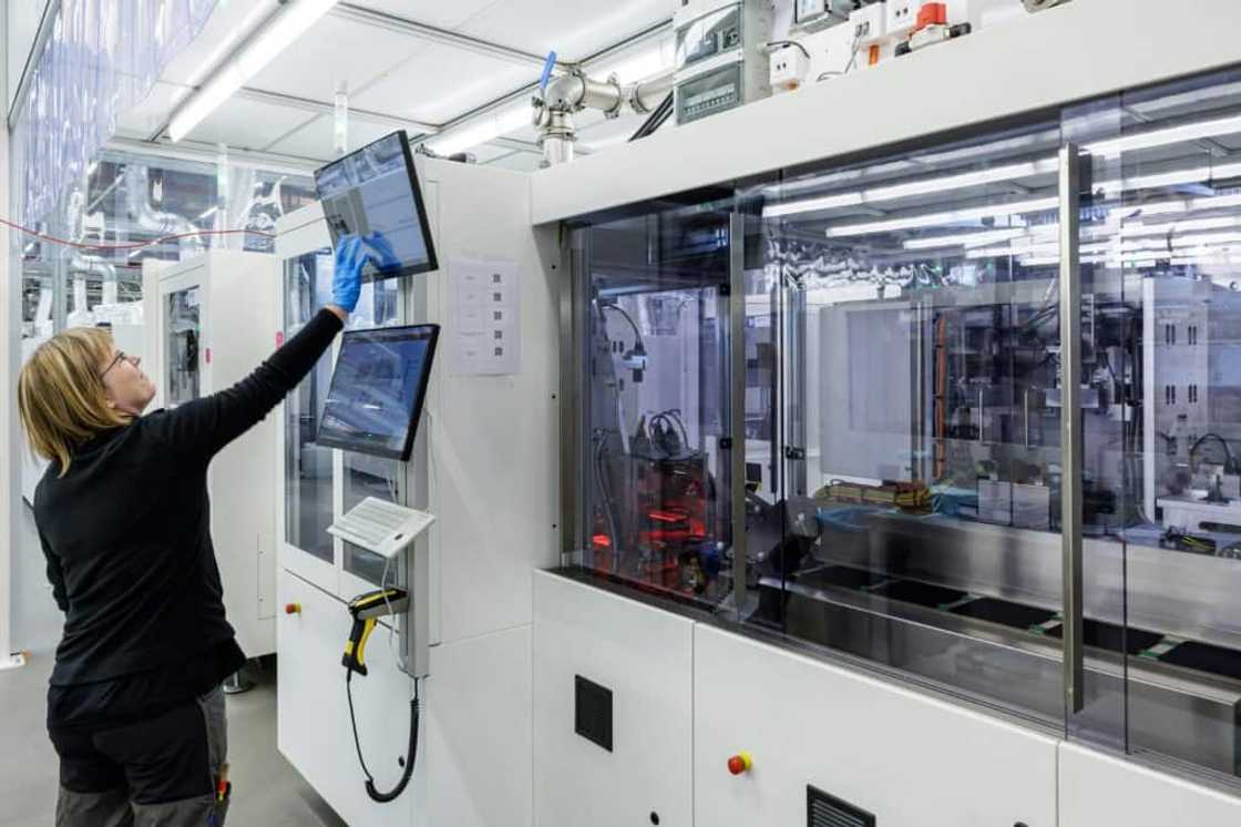 The manufacturing of solar cells is largely automated, with employees monitoring the process via computers The manufacturing of solar cells is largely automated, with employees monitoring the process via computers