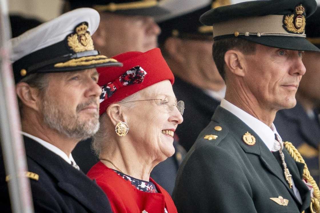 Queen Margrethe, seen flanked by her sons Crown Prince Frederik and Prince Joachim at an August parade, is now Europe's longest-serving monarch -- and only queen