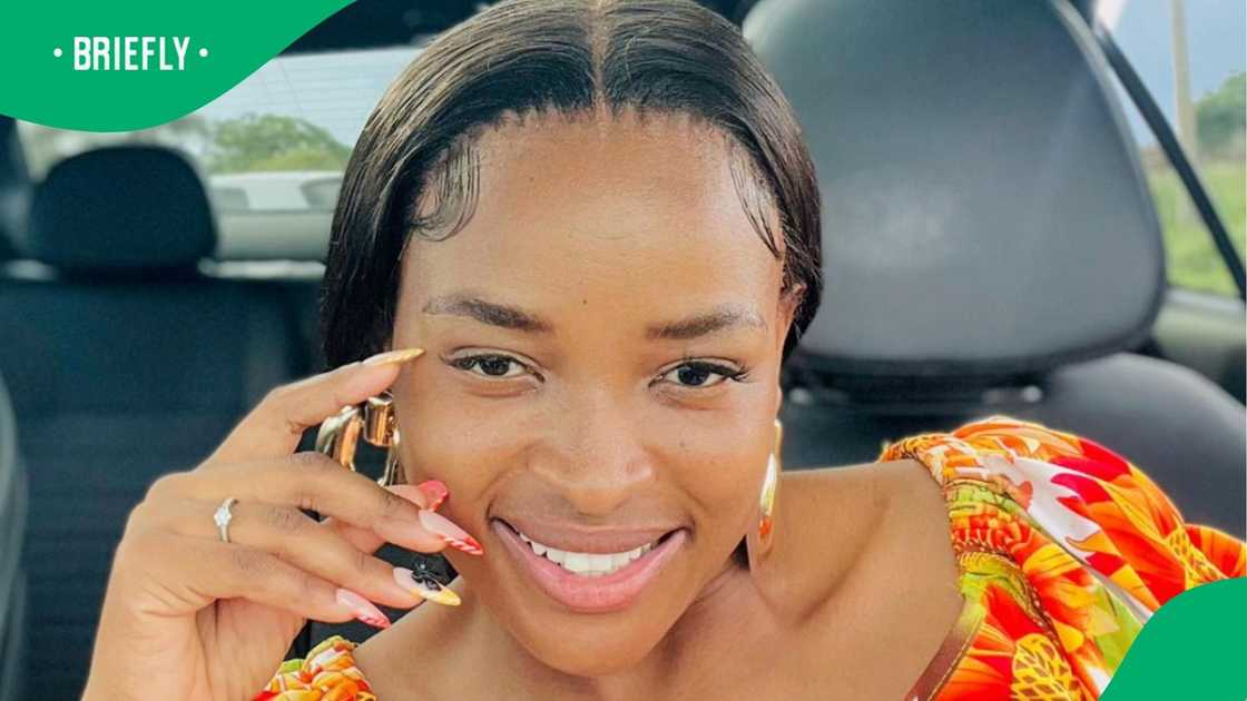 A TikTok photo of a woman in her car A TikTok photo of a woman in her car