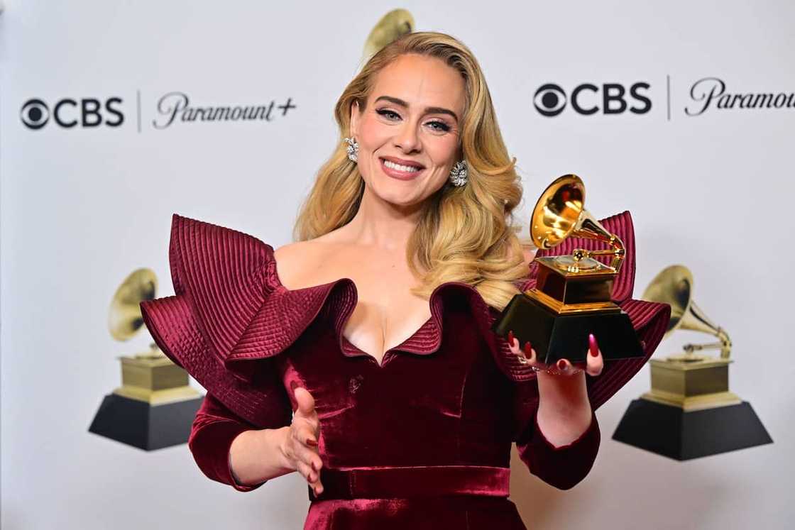 Adele poses with the award for Best Pop Solo Performance for Easy on Me Adele poses with the award for Best Pop Solo Performance for Easy on Me
