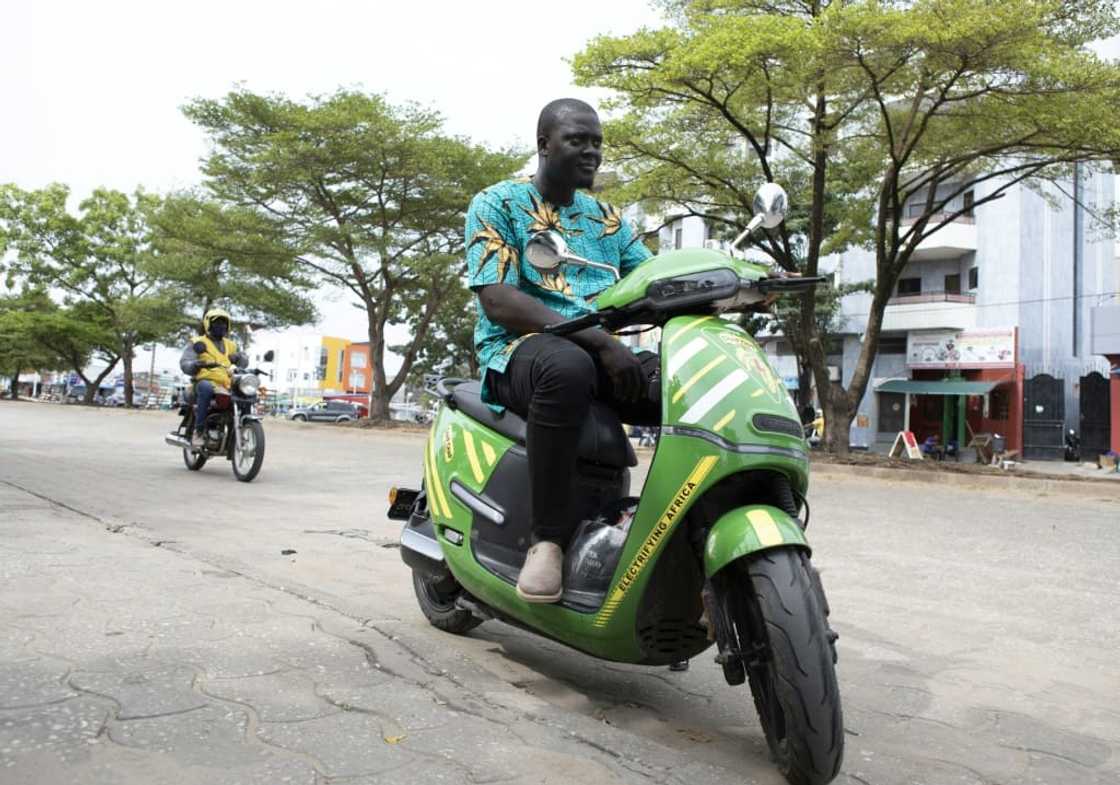 For many drivers in Cotonou, electric motorcycles are more a question of cost than pollution For many drivers in Cotonou, electric motorcycles are more a question of cost than pollution