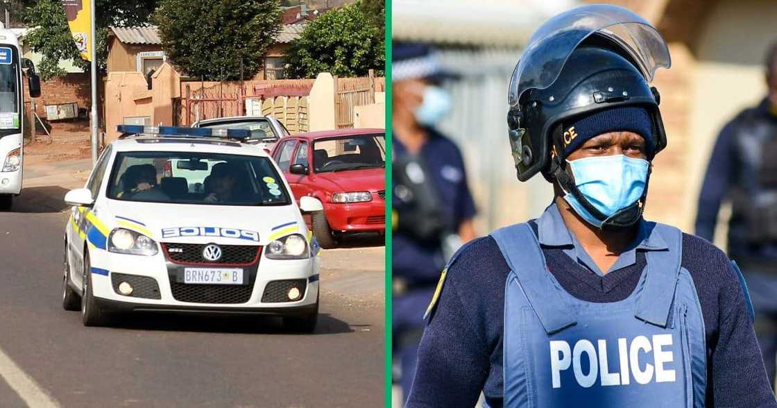 Picture of a SAPS branded VW Golf GTI and a police officer