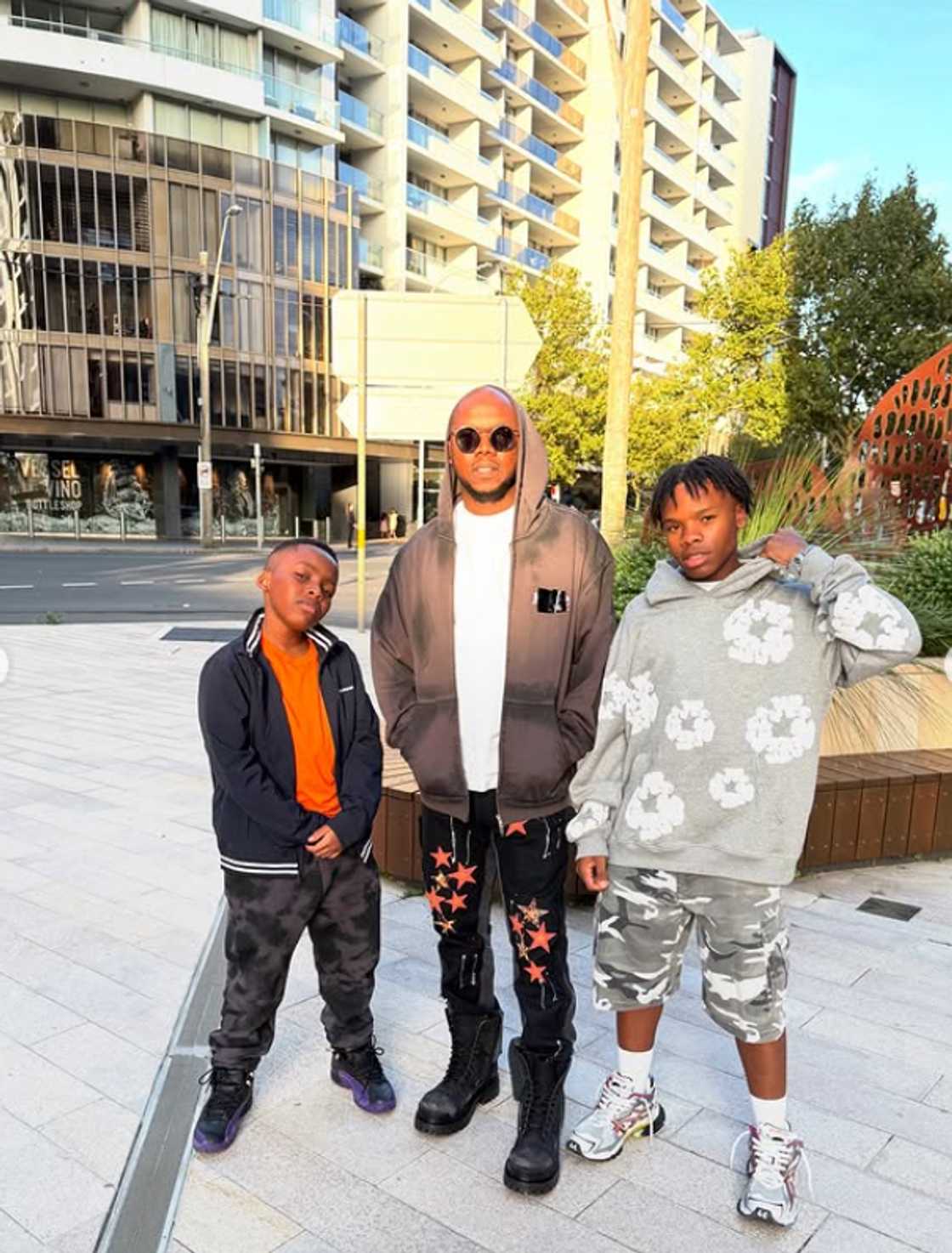 Tbo Touch and his sons out and about. Tbo Touch and his sons out and about.