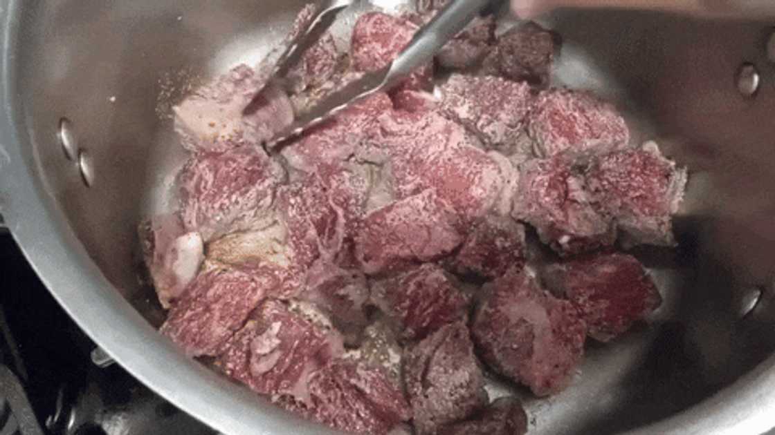 Browning meat in oil over medium heat Browning meat in oil over medium heat