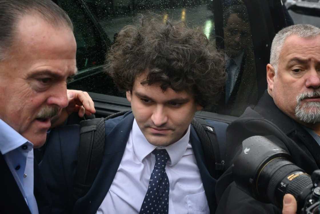 Former FTX head Sam Bankman-Fried (C) arrives to enter a plea in the Manhattan federal court, New York, on January 3, 2023 Former FTX head Sam Bankman-Fried (C) arrives to enter a plea in the Manhattan federal court, New York, on January 3, 2023